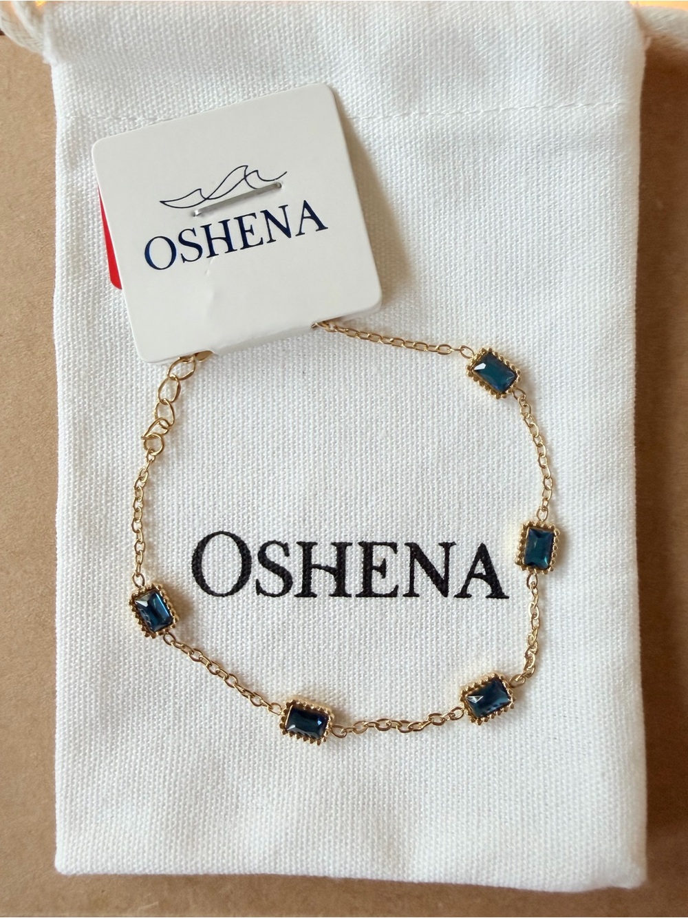 OSHENA Gold Chain Radiance Bracelet with Blue Stones
